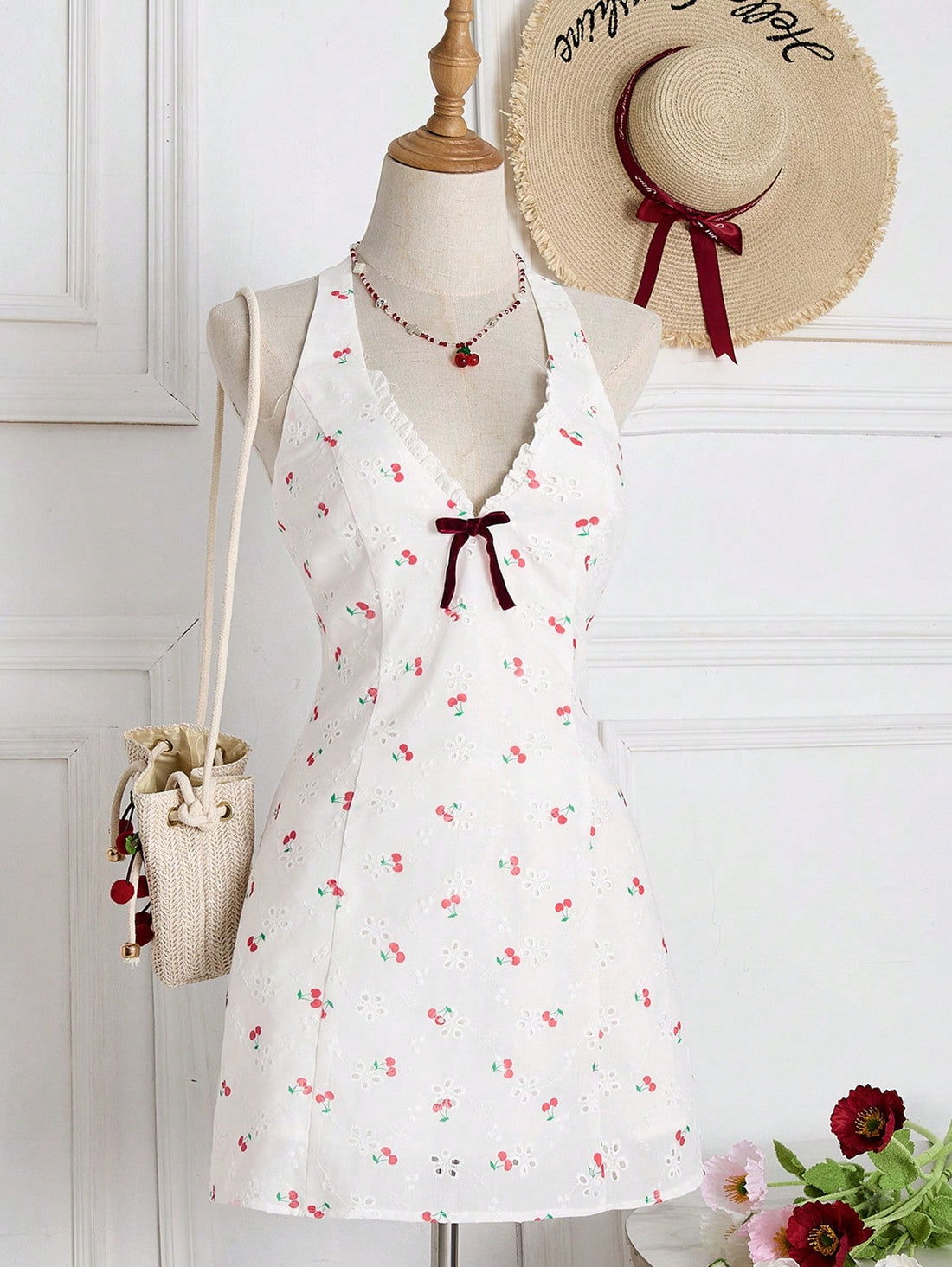 Add some cherry charm to your wardrobe with our Women's Embroidered Cherry Bow Mini Dress! Perfect for those sunny days and picnics in the park, this dress will have you feeling playful and stylish. Get ready to turn heads and make a statement this spring!