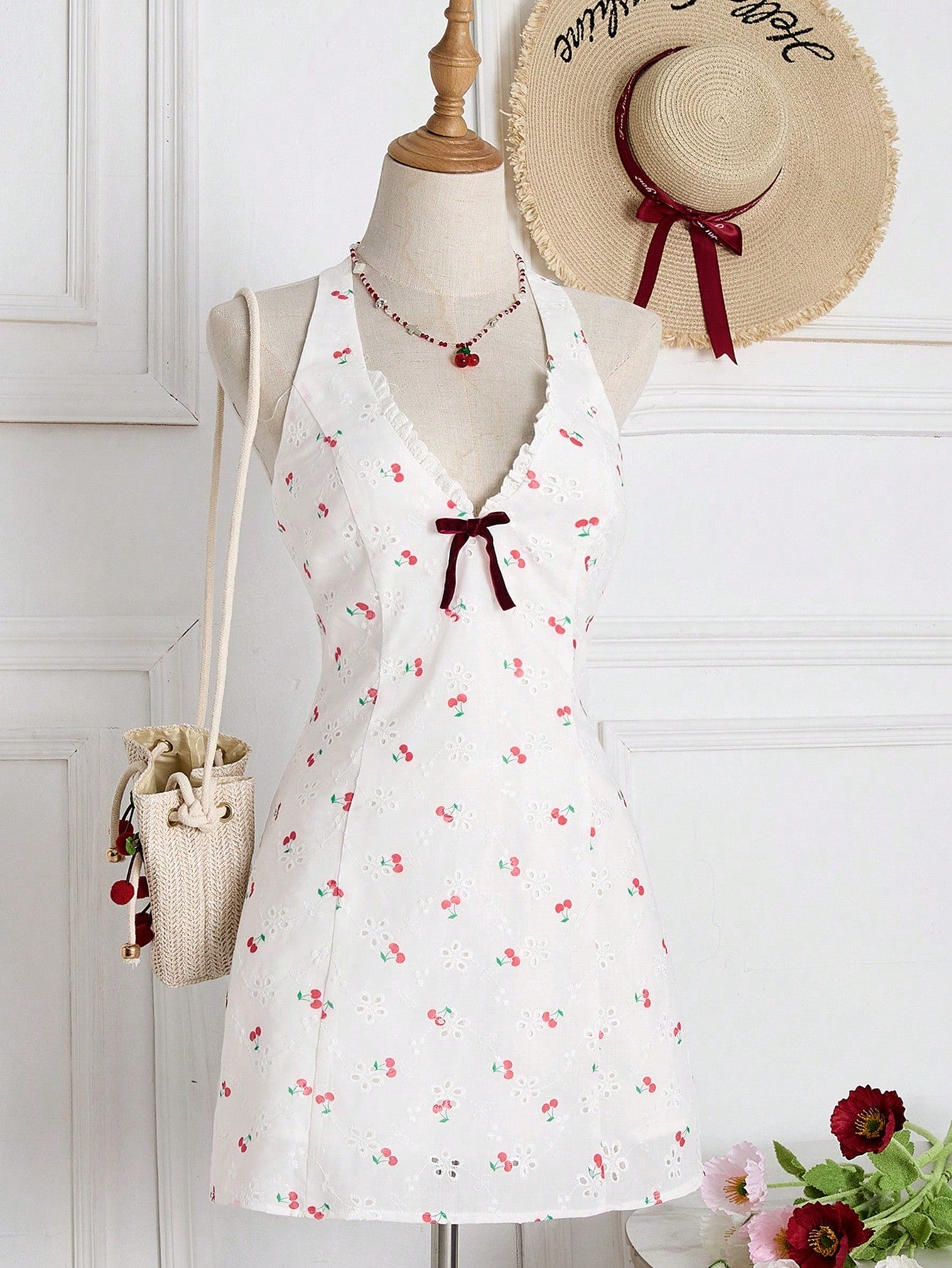 Add some cherry charm to your wardrobe with our Women's Embroidered Cherry Bow Mini Dress! Perfect for those sunny days and picnics in the park, this dress will have you feeling playful and stylish. Get ready to turn heads and make a statement this spring!