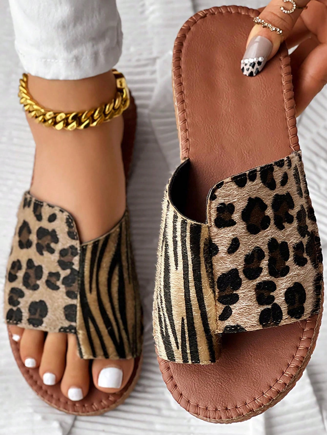 Upgrade your summer shoe game with our Women's Fashionable Summer Leopard Patchwork Slip-On Sandals. Made with high-quality materials and featuring a trendy and eye-catching leopard patchwork design, these sandals are the perfect combination of fashion and function. Slip them on for a comfortable, stylish look that will elevate any outfit.