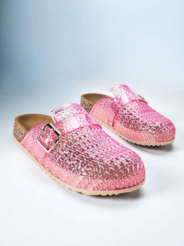 Translucent pink woven jelly clog mules with buckles, cork-look footbeds, and beige soles