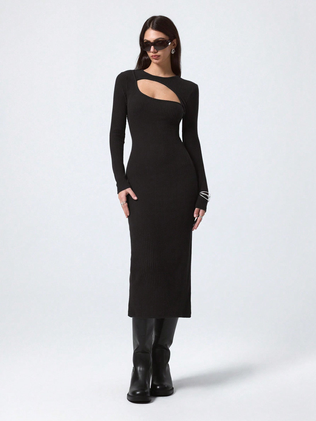 Step into the spotlight with this playful mid-length party dress crafted from cozy fleece. Its ribbed texture and hollow details add a flirty twist, making it perfect for dancing the night away in style and comfort. Whether it’s a casual gathering or a festive celebration, this dress keeps you chic and snug all evening long.