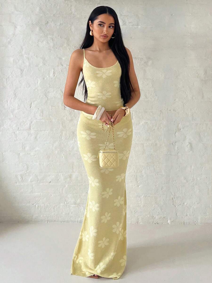 Full front view of yellow floral knit crop top and mermaid maxi skirt set