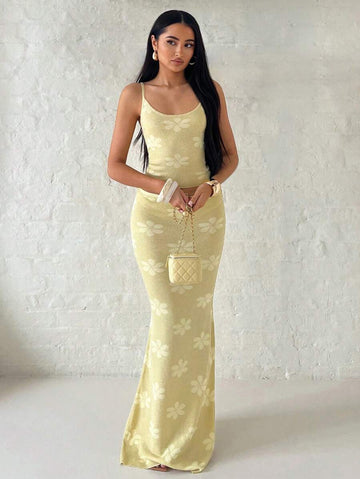 Full front view of yellow floral knit crop top and mermaid maxi skirt set