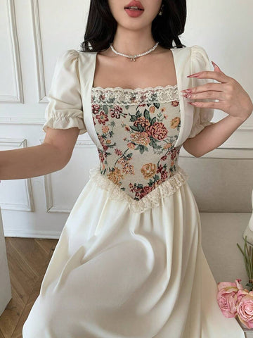 Front view of vintage floral tapestry bodice puff sleeve maxi dress showing visible color, print, and silhouette