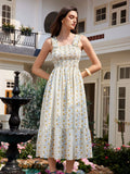 Step into sunshine and smiles with this Women's Floral Print Midi Dress! Featuring a playful ruffle trim and breezy sleeveless design, it’s perfect for casual days or resort escapes. The vibrant floral pattern adds a splash of fun, while the flattering midi length keeps you dancing all day long. Embrace effortless style and carefree comfort wherever you go!