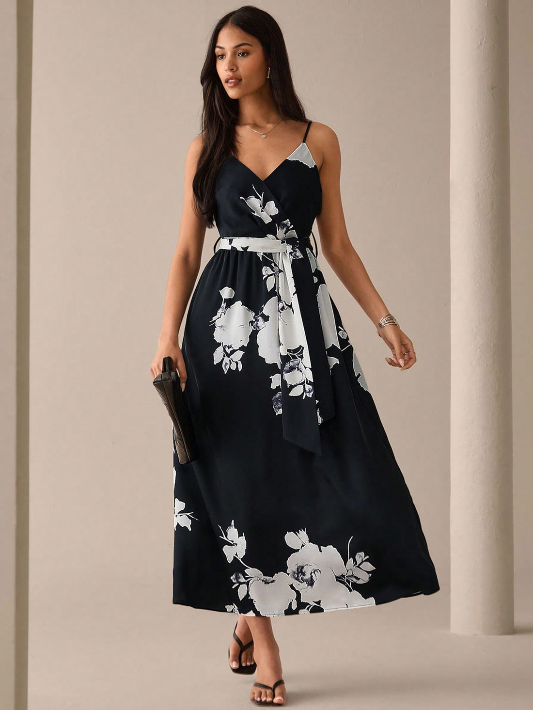 Step out in style with this Women's Floral Print Long Cami Dress, featuring a flattering self-tie waist that lets you customize your fit. Its breezy design and vibrant floral pattern bring a playful touch to your wardrobe, perfect for everything from casual brunches to city strolls. Embrace effortless elegance with a dress that’s as fun as it is chic.
