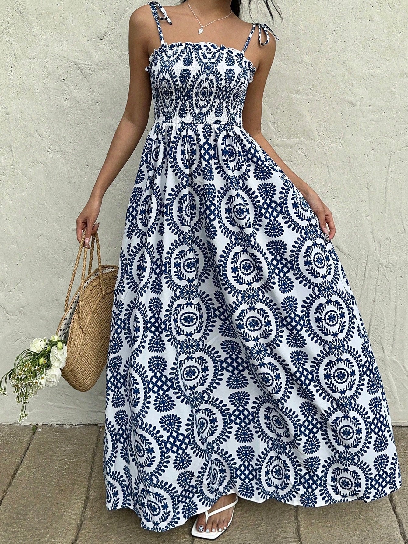 Bring a touch of whimsy to your wardrobe with our floral pocket dress. Designed for casual spring and summer days, this essential piece features a retro-inspired print and convenient pockets. Perfect for any occasion, from picnics to brunch with friends. (Pockets to hold all your essentials, from phone to snacks!)