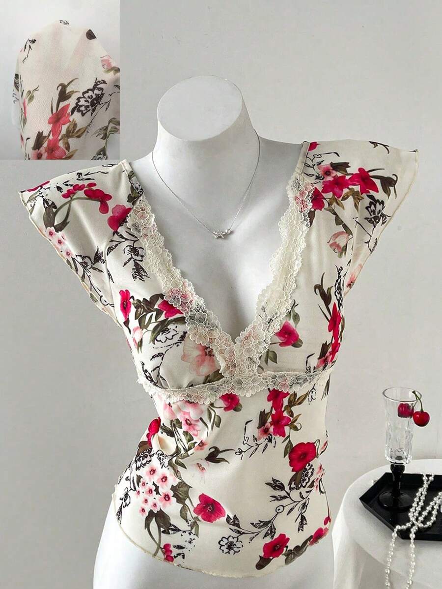 Elevate your casual look with this Women's Lace Patchwork V-Neck Knit T-Shirt. The delicate lace details add a flirty touch, while the soft knit fabric ensures all-day comfort. Its stylish patchwork design and sexy V-neckline make it perfect for turning heads wherever you go. Play up your fun side with this effortlessly chic top!