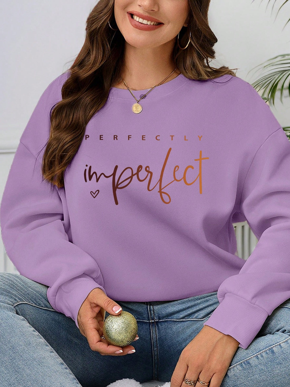 Get cozy and make a statement with our Women's Large Slogan Graphic Hoodie. Featuring a comfortable round neck and a playful graphic, this sweatshirt is perfect for lounging or running errands. Stay warm and stylish with this must-have piece.