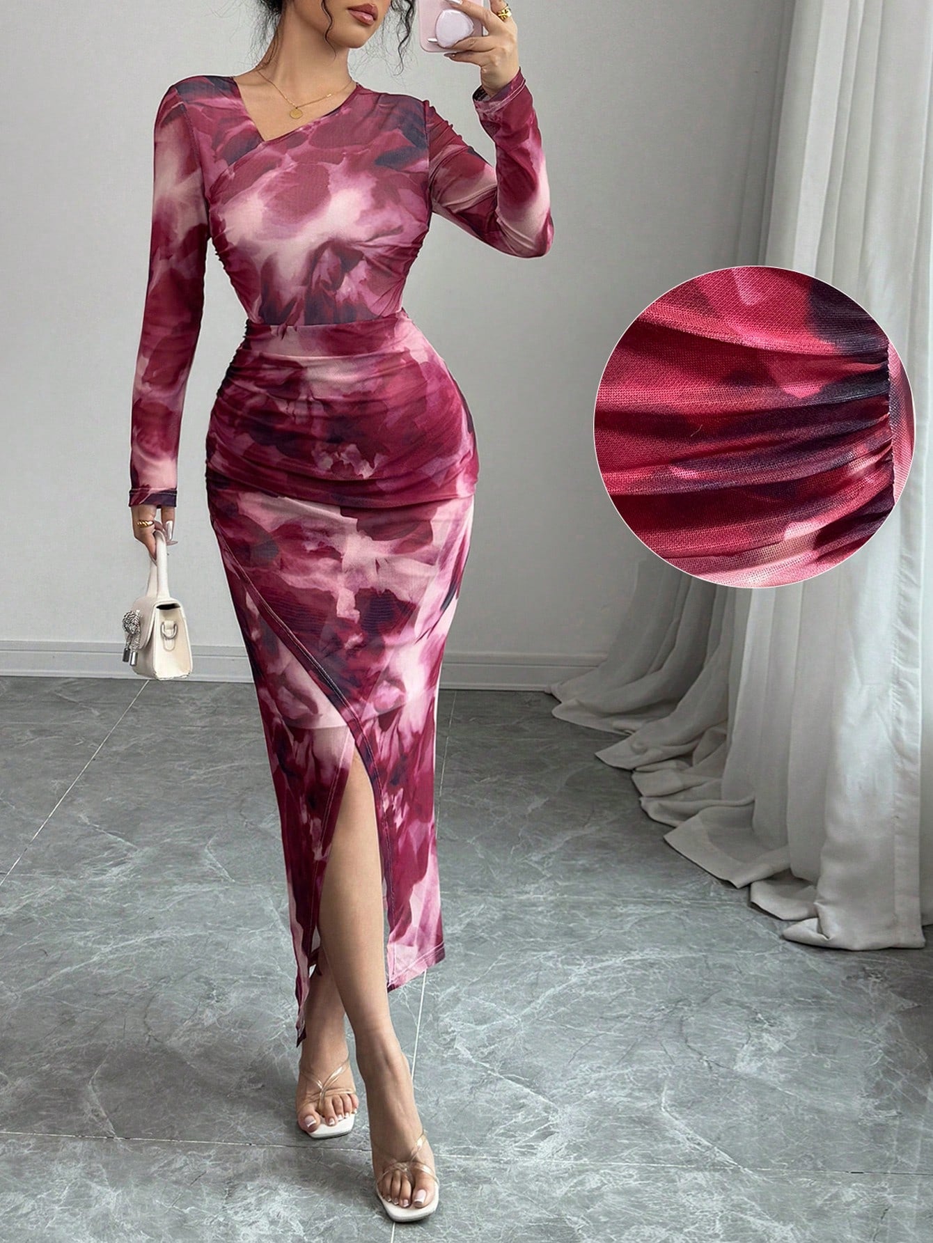 Be the trendsetter in this playful and flowing long sleeve mesh dress. With its asymmetrical hem and trendy tie-dye print, this dress is sure to turn heads. Express your unique style while staying comfortable in this fun and fashionable piece.