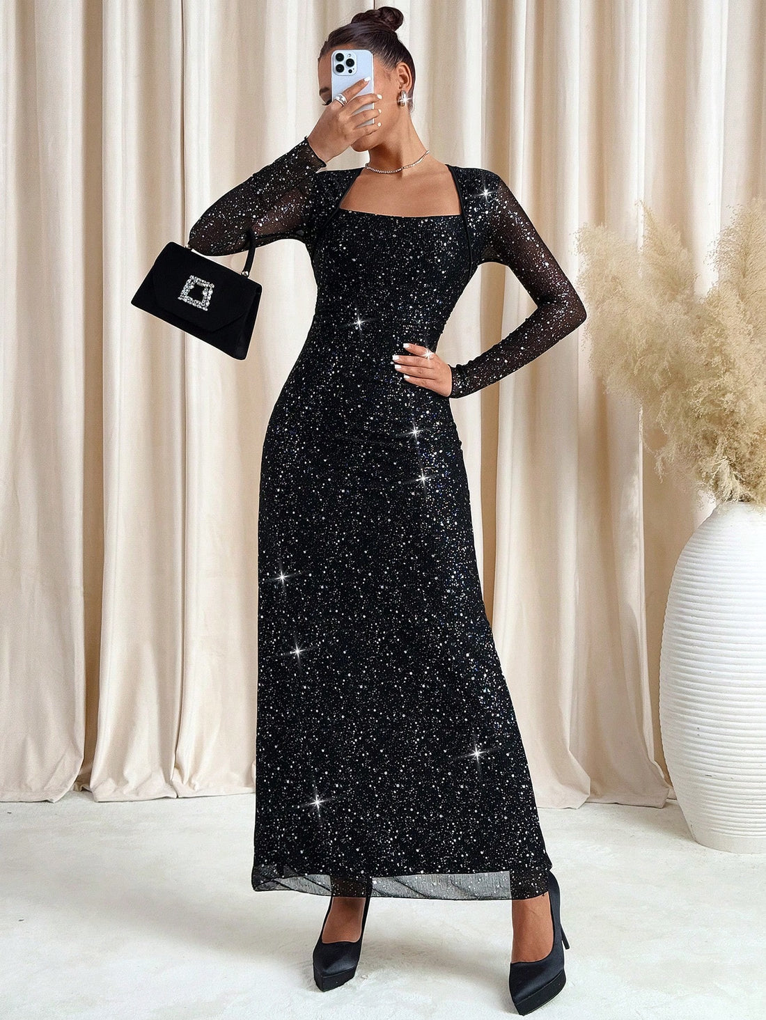 Turn heads this Valentine’s Day with our Women’s Long Sleeve Metallic Shimmer Dress. Its sparkling fabric catches the light beautifully, adding a touch of glamour to your evening. The long sleeves offer a chic, elegant silhouette while keeping you cozy. Perfect for celebrating love in style, this dress combines festive shimmer with timeless fashion flair.