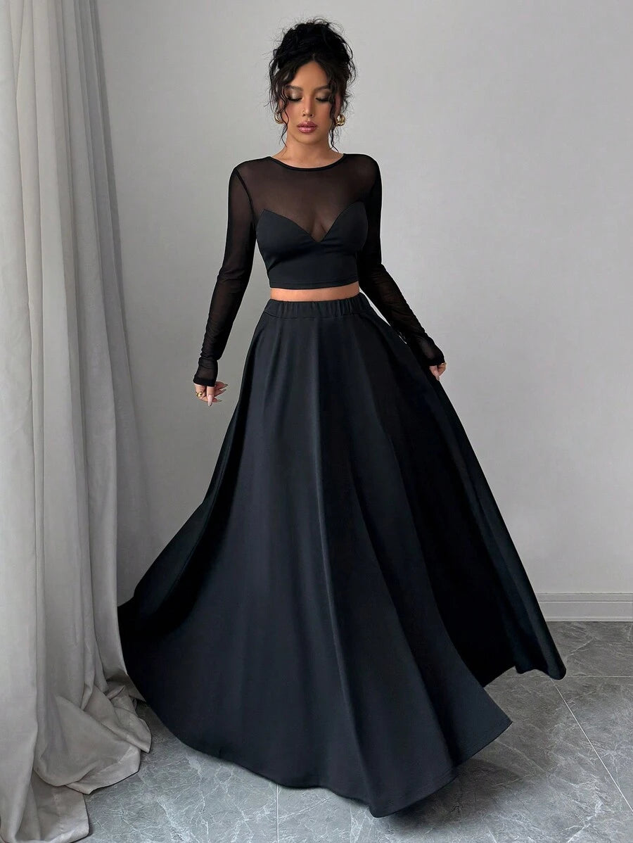 Elevate your wardrobe with this chic mesh patchwork set that effortlessly transitions from festival vibes to everyday chic. The lightweight t-shirt pairs perfectly with the flowing long skirt, creating a minimalist silhouette that flatters every frame. Whether you're jet-setting on vacation, dancing through a music festival, or simply wanting to look put-together, this versatile duo delivers style without the fuss. Mix, match, or wear together—the possibilities are endless!