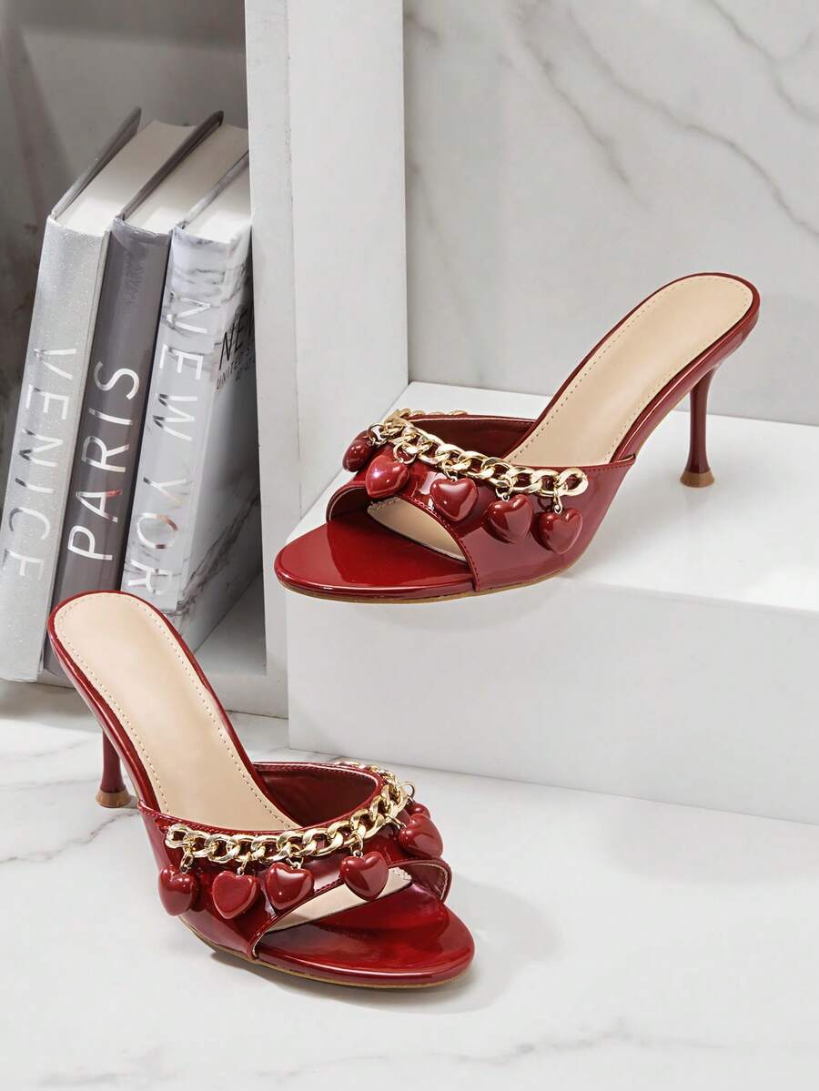 Step into elegance with these Women's Metallic Heart Decor Heeled Sandals. Featuring shimmering heart embellishments that catch the light beautifully, these sandals blend style with comfort for any occasion. The sleek heeled design elongates your silhouette while the metallic accents add a touch of glamour and sophistication. Perfect for everyday wear, special celebrations, holiday parties, Christmas gatherings, and Valentine's Day romance, these versatile sandals transition seamlessly from day to night. 