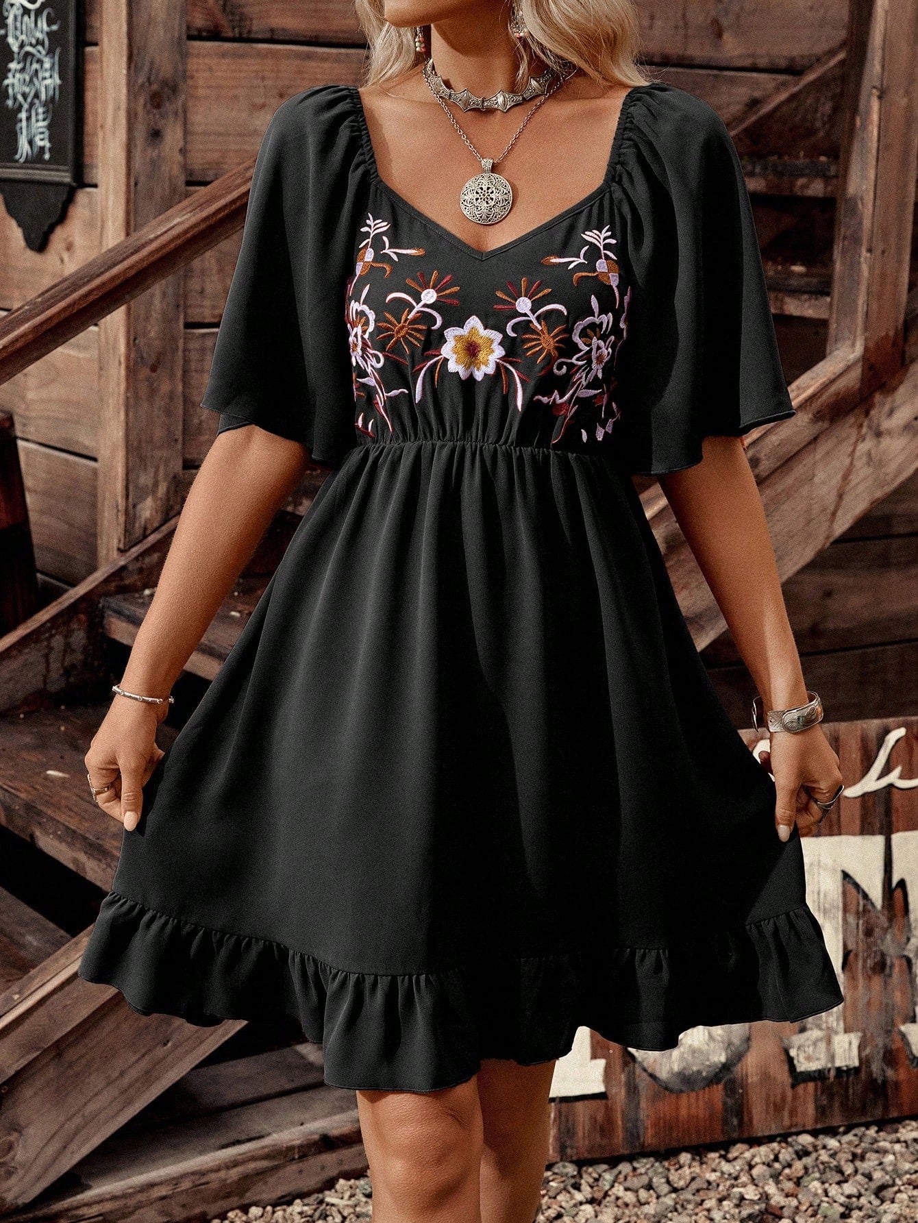 Step into charm with this Women's Mid Sleeve Embroidered Ruffle Hem Dress! Featuring delicate embroidery and a flirty ruffle hem, it cinches at the waist to highlight your silhouette. Perfect for adding a playful yet elegant touch to any occasion.