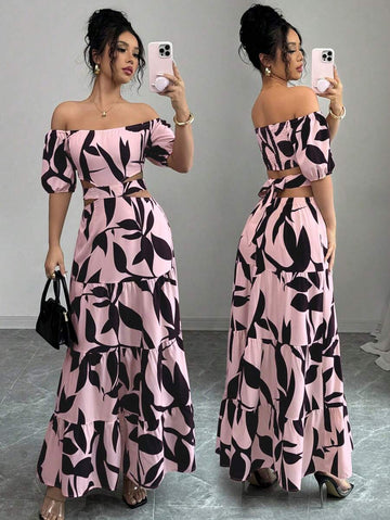 Escape to paradise in this charming off-shoulder dress that's practically begging for a vacation photo. The vibrant floral print brings instant tropical vibes, while the playful tie-up detail and asymmetrical hem add just the right amount of sass. Perfect for beach days, resort dinners, or anywhere you want to feel effortlessly chic and carefree. Slip it on and let the adventure begin!