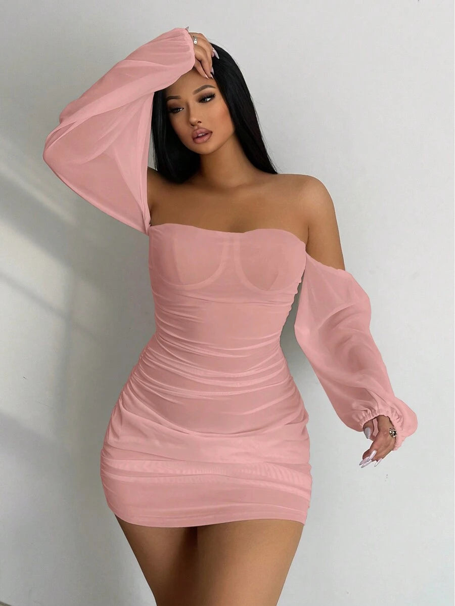 Turn heads this season in our Women's Off-Shoulder Long Sleeve Fitted Short Dress—the perfect blend of flirty and fabulous. The off-shoulder neckline adds a touch of elegance while the fitted silhouette flatters your curves beautifully. Long sleeves keep you cozy as temperatures drop, making this your go-to piece for fall gatherings, date nights, or casual outings. Versatile enough to dress up with heels or down with sneakers, this essential dress proves that style doesn't have to be complicated. Make it yo
