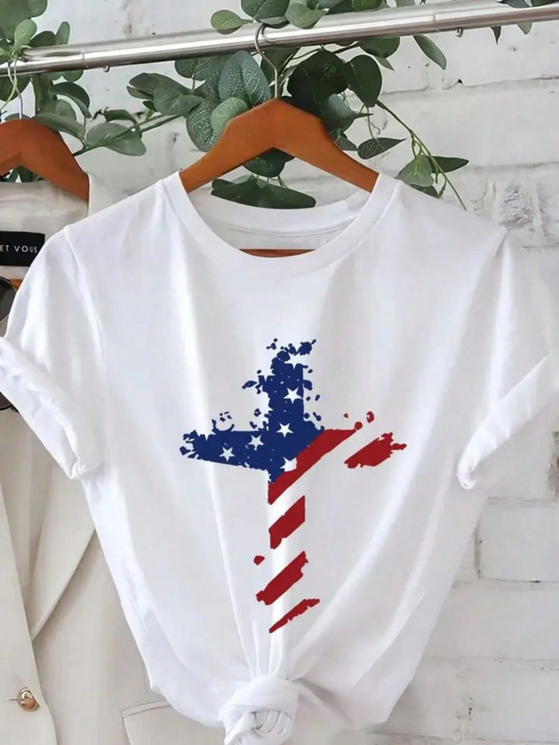 Celebrate your spirit in style with this playful Women's Patriotic American Flag Graphic T-Shirt. Crafted from breathable cotton, it keeps you cool and comfy during sunny summer days. Perfect for casual outings or festive gatherings, this tee adds a fun, patriotic flair to your wardrobe while letting you show off your love for the USA with ease.