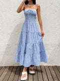 Unleash your inner adventurer with our Women's Plaid Sleeveless Long Dress! Perfect for casual resort wear, this dress will keep you stylish and comfortable during all your summer adventures. So go ahead, pack your bags and hit the road (or beach) with ease!