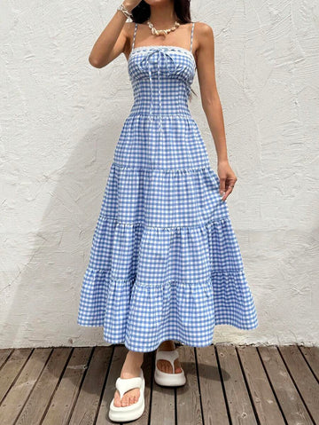 Unleash your inner adventurer with our Women's Plaid Sleeveless Long Dress! Perfect for casual resort wear, this dress will keep you stylish and comfortable during all your summer adventures. So go ahead, pack your bags and hit the road (or beach) with ease!