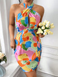Unleash your inner elegance and playful side with our Women's Plunge Neck Halter Dress. This dress features a tie waist for a flattering silhouette and a vibrant, full print design. Perfect for any occasion, this dress will make you stand out in a crowd!