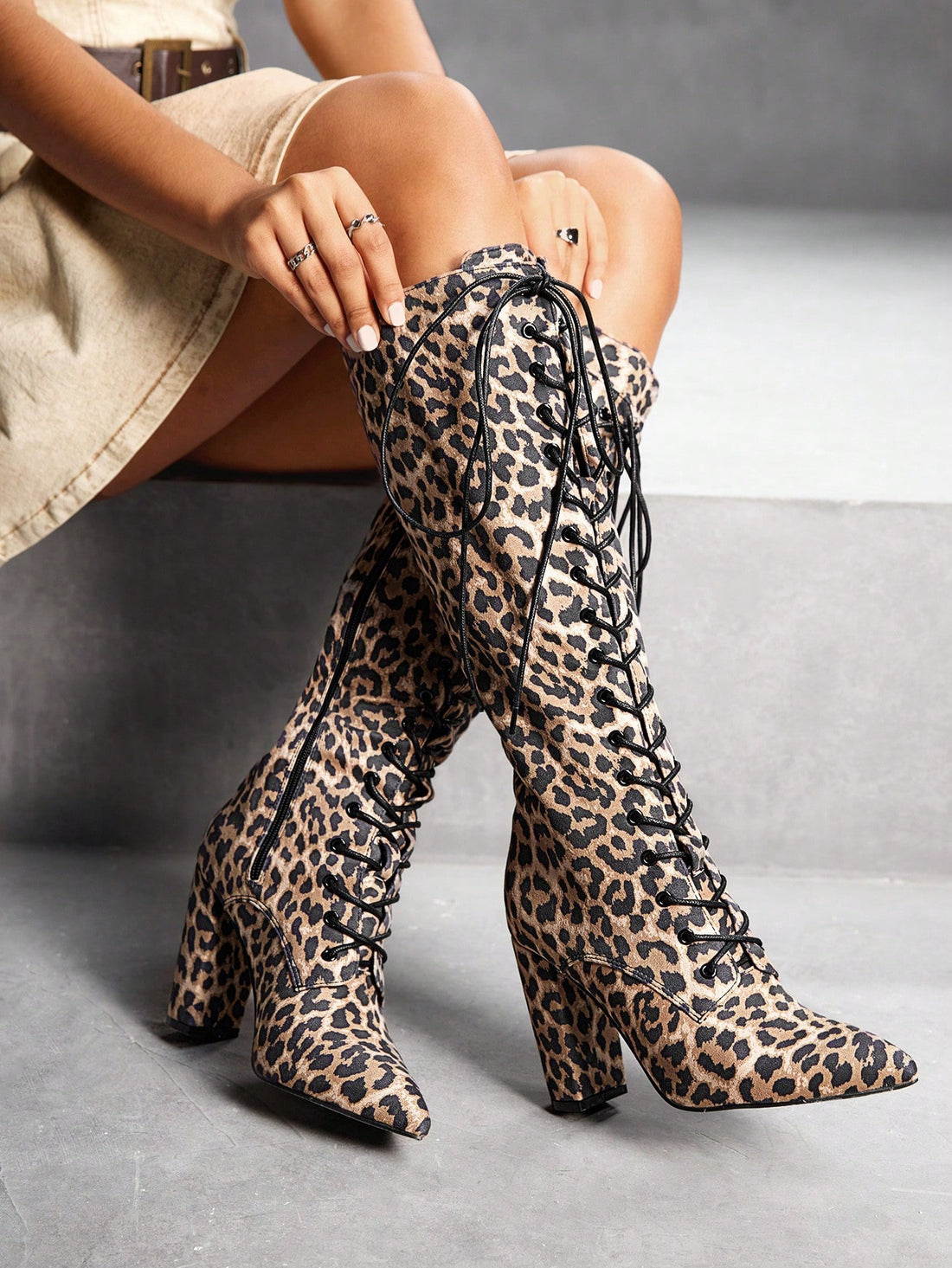 Step into style this fall with our Women's Pointed Toe Lace-Up Block Heel Knee-High Boots! These boots are not only perfect for the season, but also for any festive occasion. With their elegant pointed toe and lace-up design, you'll be turning heads wherever you go. Update your wardrobe now.