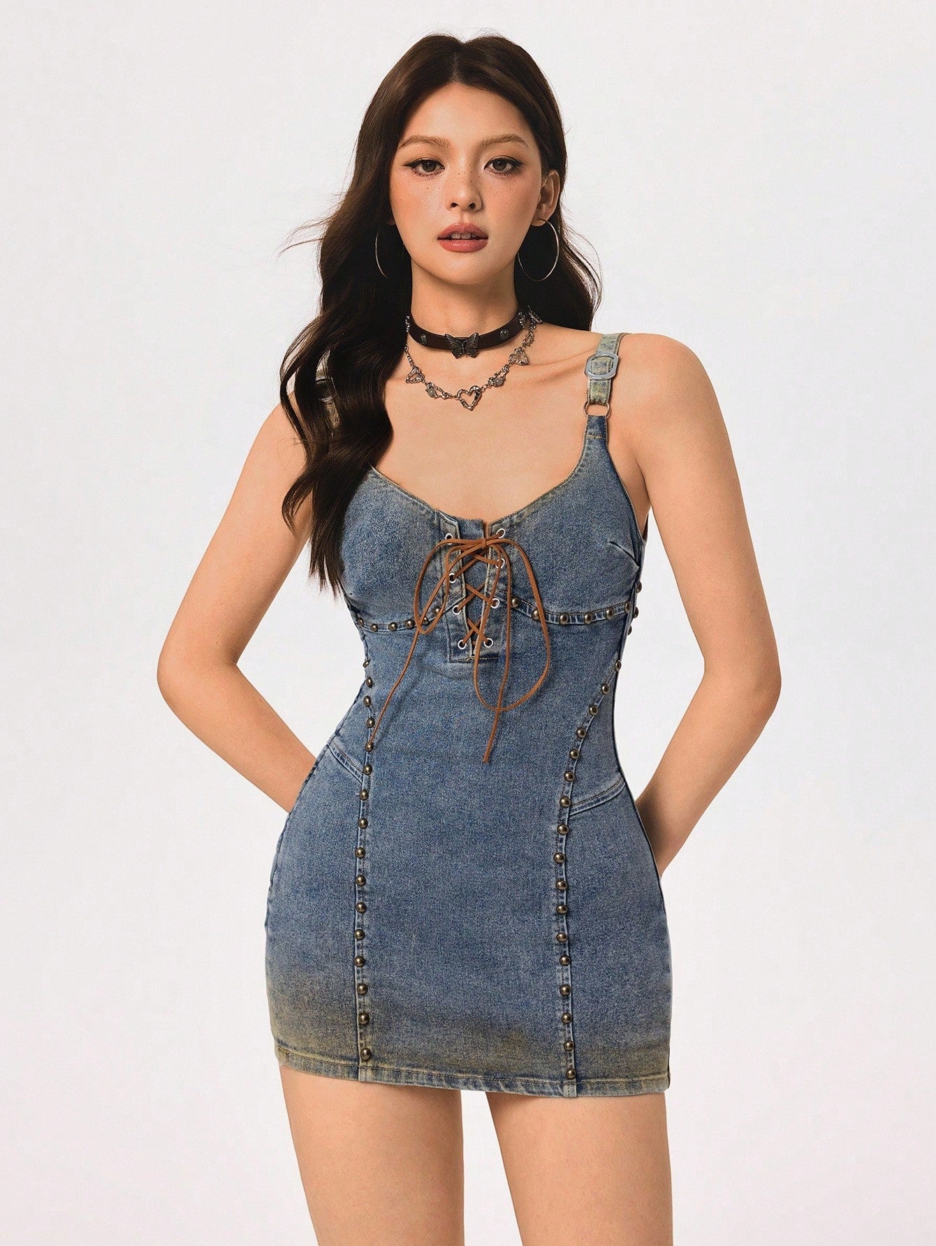 Turn heads with this Women's Retro Denim Camisole Dress, where classic American style meets a sexy, fitted silhouette. Perfect for those who want to flaunt their curves with a playful, vintage vibe. Easy to dress up or down, this denim dress is your new go-to for casual outings or fun nights out. Embrace a timeless look that never goes out of style!