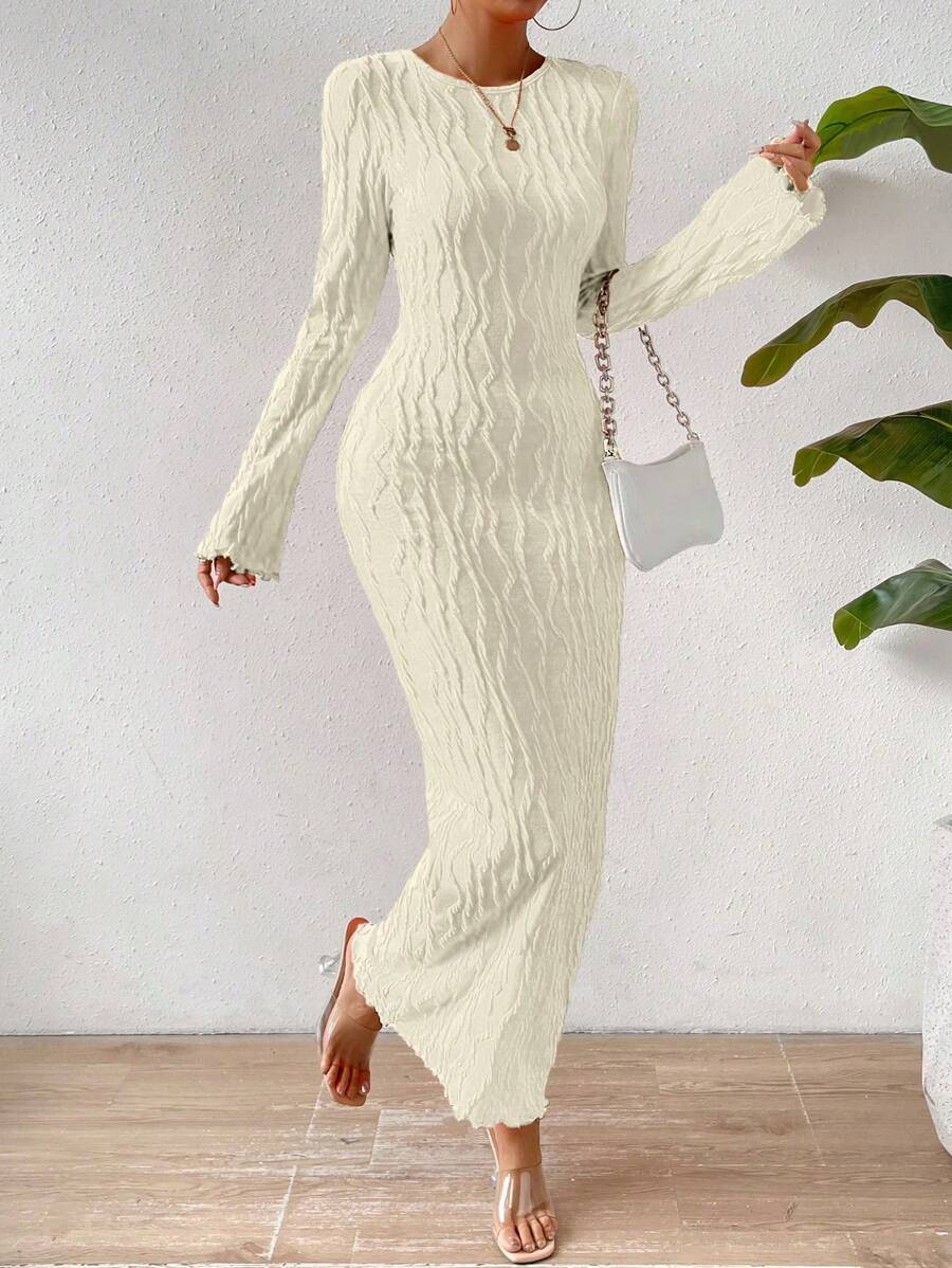 Elevate your evening look with this sophisticated rib-knit bodycon maxi dress. Crafted from a luxurious solid fabric, it hugs your curves beautifully while maintaining an elegant silhouette. The delicate lettuce trim detailing adds a refined touch to the neckline and hem, creating a polished finish perfect for formal events, cocktail parties, or upscale dinners.&nbsp;
