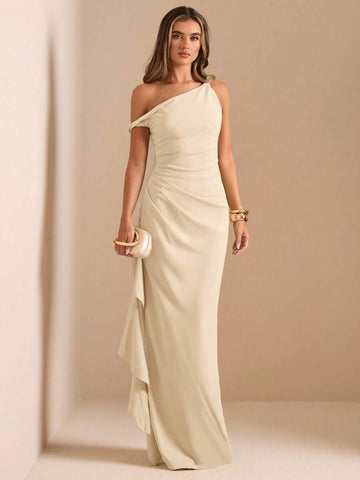 Make a statement at your next evening event in this luxurious satin dress. The elegant oblique shoulder design with twist knot detail and cold shoulder sleeves creates a sophisticated silhouette, while the high slit and ruffle hem add alluring movement. Cut with a high waist and slim fit in a flattering A-line shape, this maxi dress hugs your curves beautifully. The asymmetrical neckline and wrap hem elevate the overall elegance. 