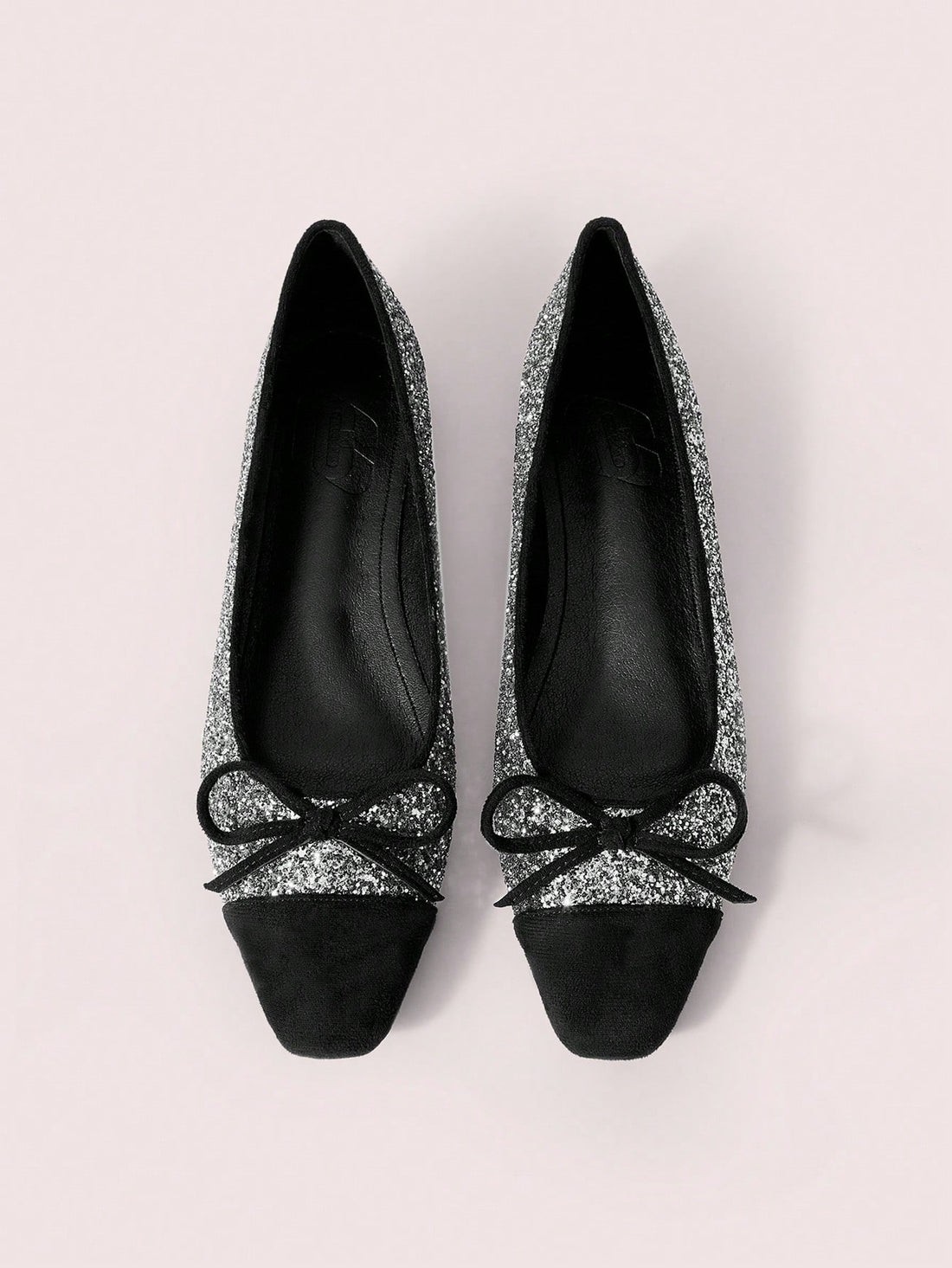 Enhance your style with our Women's Sequin Square Toe Flats. The sparkling sequins add a touch of glamour, perfect for any occasion. These comfortable flats will keep you shining all day long. Add a little sparkle to your wardrobe today!