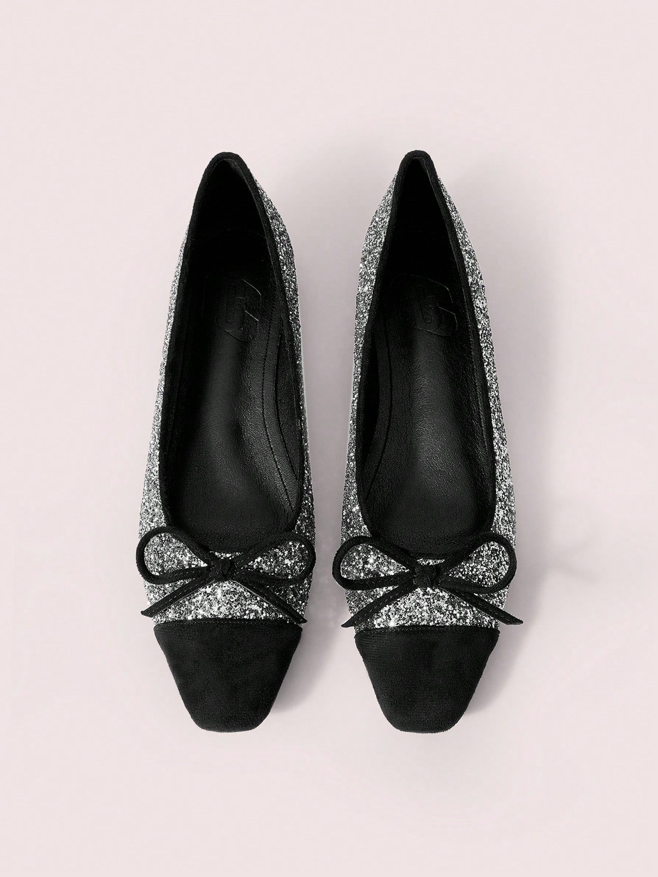 Enhance your style with our Women's Sequin Square Toe Flats. The sparkling sequins add a touch of glamour, perfect for any occasion. These comfortable flats will keep you shining all day long. Add a little sparkle to your wardrobe today!