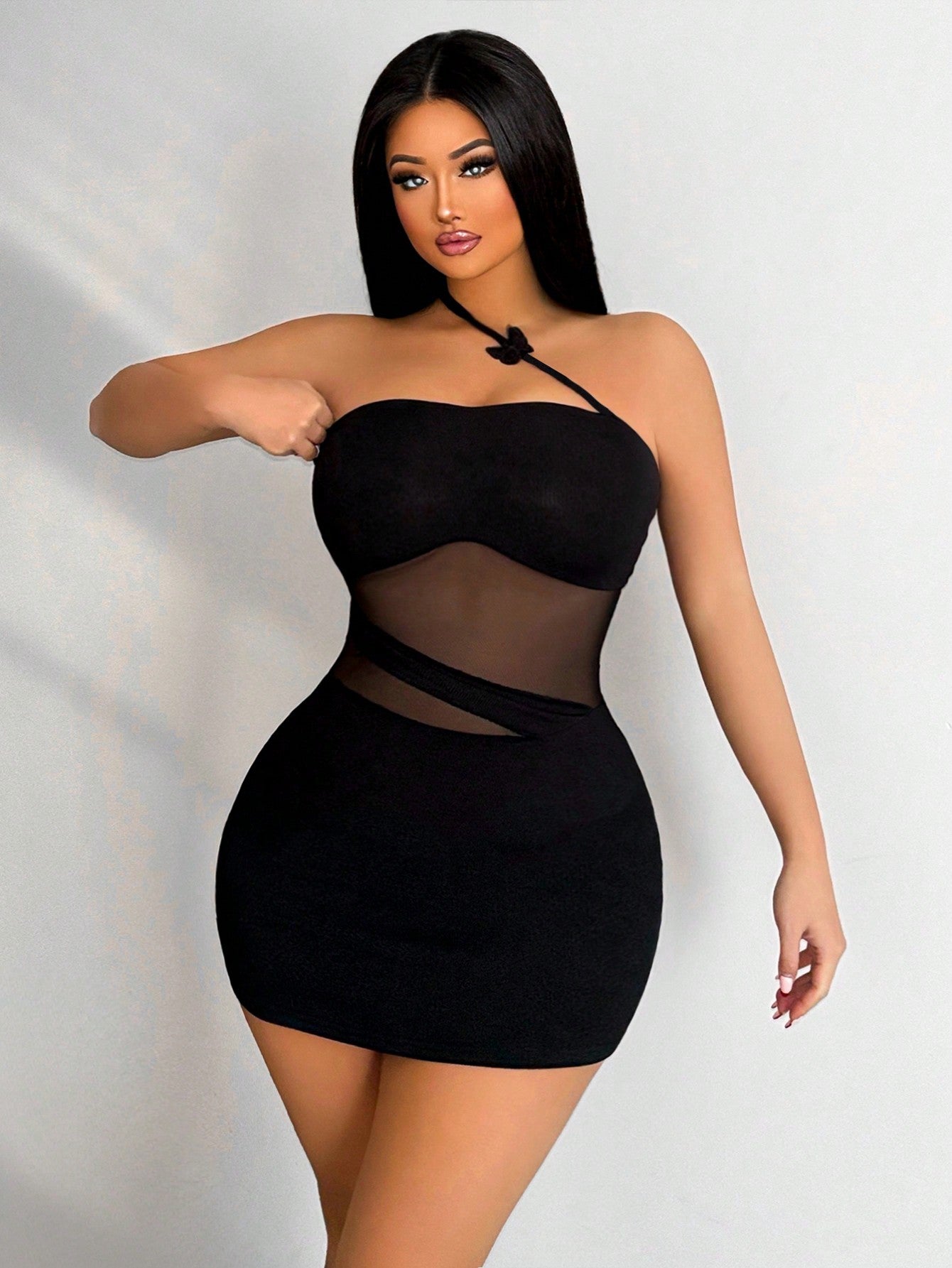 Turn heads this season in our Women's Sheer Mesh Mini Dress, where contemporary patchwork design meets effortless style. The lightweight mesh fabric drapes beautifully while the bold color-blocking creates visual interest from every angle. Perfect for summer adventures, beach parties, or nights out with friends, this dress pairs seamlessly with your favorite sneakers or strappy heels. The mini silhouette offers a flirty, confident vibe that celebrates your personal style. Whether you're layering it over a s
