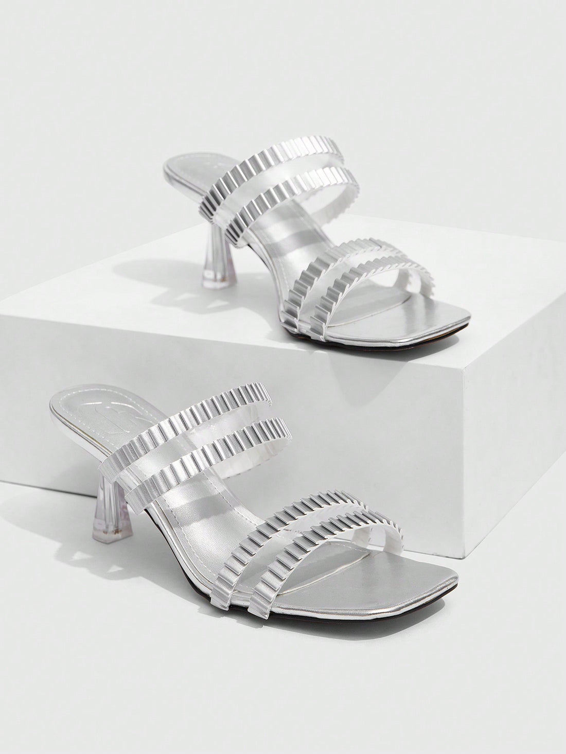 Step out in style with our Women's Silver Pointed Toe High Heel Sandals! These sleek and sexy sandals are perfect for date nights and parties, giving you the confidence and elegance you need to make a statement. With a pointed toe design and high heel, you'll turn heads and steal the show.
