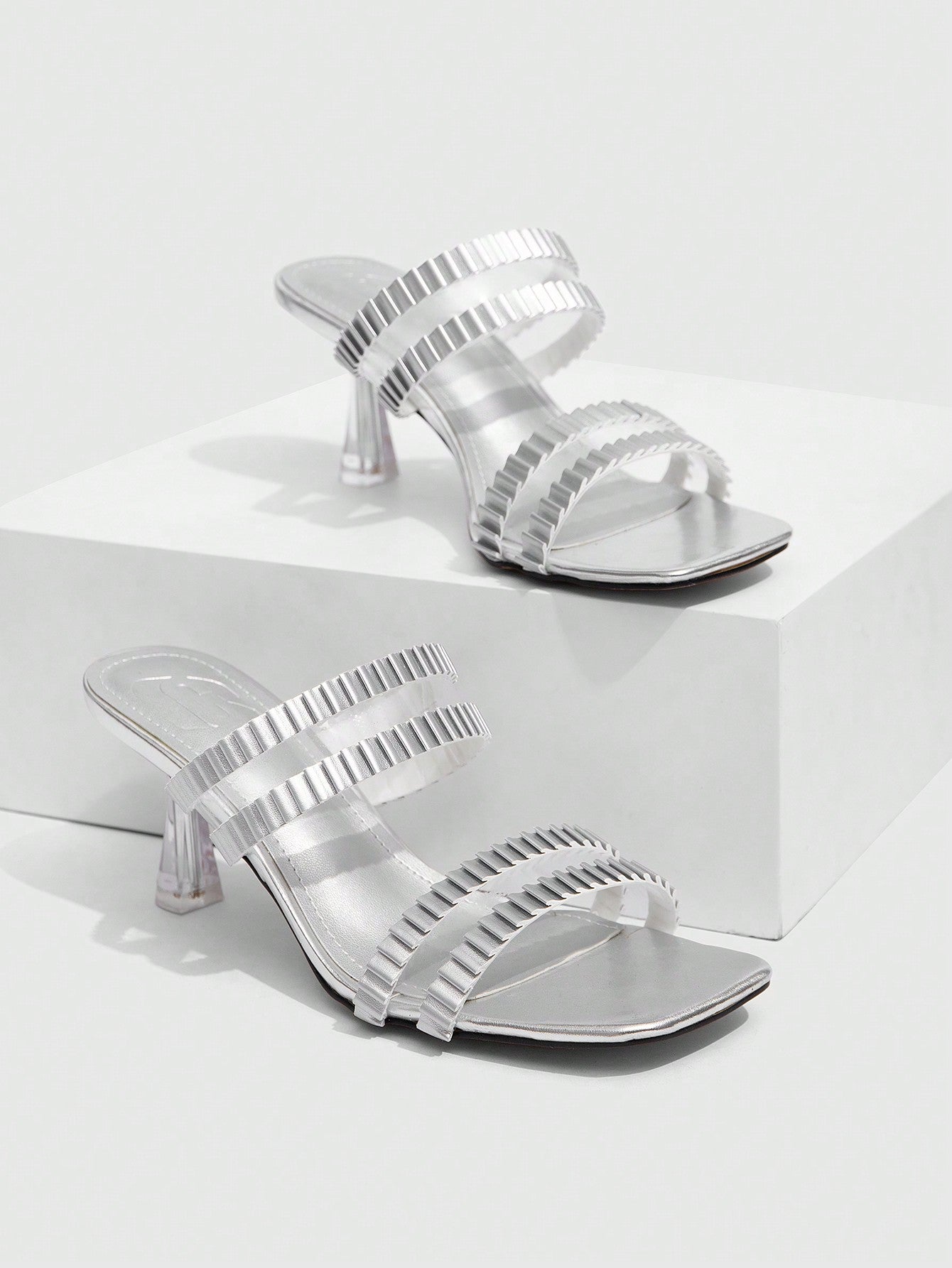 Step out in style with our Women's Silver Pointed Toe High Heel Sandals! These sleek and sexy sandals are perfect for date nights and parties, giving you the confidence and elegance you need to make a statement. With a pointed toe design and high heel, you'll turn heads and steal the show.