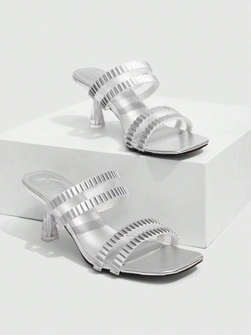 Step out in style with our Women's Silver Pointed Toe High Heel Sandals! These sleek and sexy sandals are perfect for date nights and parties, giving you the confidence and elegance you need to make a statement. With a pointed toe design and high heel, you'll turn heads and steal the show.