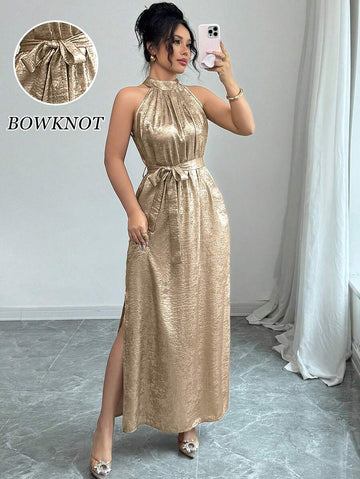 Step out in style with this playful sleeveless summer dress, featuring a dramatic long slit and shimmering foil print. Perfect for parties and special occasions, it combines breezy comfort with eye-catching flair to keep you dancing all night long.