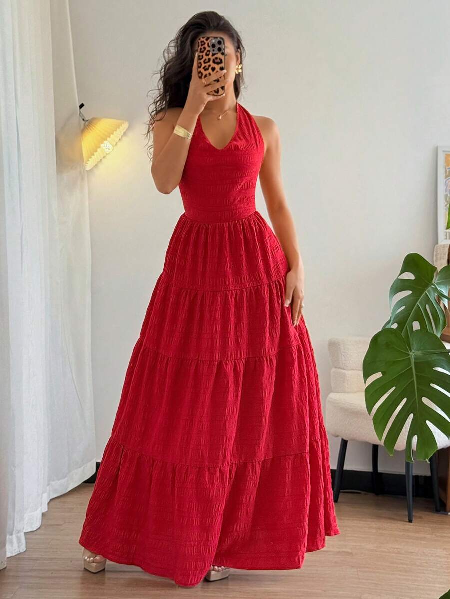 Treat yourself to effortless elegance with our Women's Spaghetti Strap V-Neck Backless Cake-Shaped Dress. With its playful shape and sophisticated design, this dress is perfect for any occasion. Let your inner fashionista shine in this quirky, yet classy piece.