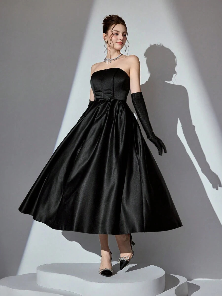 Elevate your seasonal wardrobe with this versatile strapless sundress, designed to transition seamlessly from casual daytime gatherings to evening celebrations. The classic ball gown silhouette flatters various body types while the strapless neckline offers a sophisticated, modern aesthetic perfect for birthdays, summer parties, and special occasions. Crafted for comfort and style, this dress combines timeless elegance with contemporary flair, making it an essential piece for any woman's collection. Whether