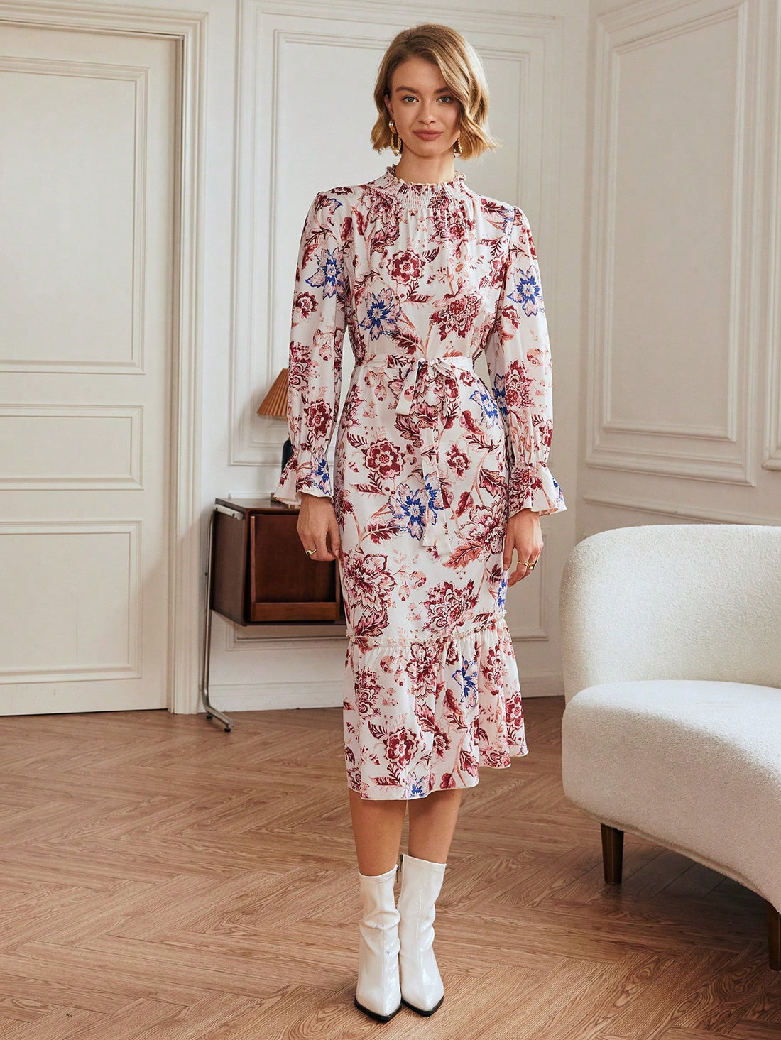 Effortlessly elegant and stylish, this long sleeve dress features an all-over print and comes with a belt for a flattering fit. Perfect for any occasion, this dress will keep you feeling confident and fashionable.
