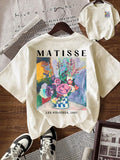 Flat lay of apricot floral art T-shirt showing large Matisse peony print and small chest design