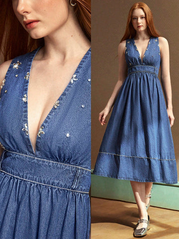 Effortlessly cool meets undeniably comfy in this breezy denim dress! The delicate spaghetti straps keep things light and airy, while the classic denim fabric brings that timeless, go-anywhere vibe. Perfect for casual coffee dates, weekend adventures, or those days when you want to look put-together without trying too hard. Throw on your favorite sneakers for laid-back charm or dress it up with sandals and accessories for instant polish. This wardrobe essential transitions seamlessly from season to season, p