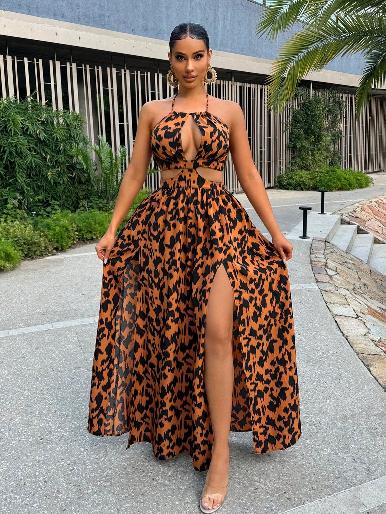 Expertly designed for the modern woman, our Women's Summer Halter Neck Dress features an all over print for a unique touch, side slits for added breathability, and an open back for a sexy and chic look. Perfect for all your summer events, this dress will keep you stylish and comfortable.