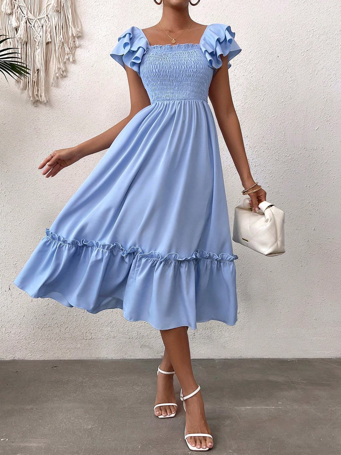 Looking for the perfect casual holiday outfit? Look no further than our Women's Summer Ruffle Shirred A-Line Maxi Dress! With delicate ruffles and a flattering A-line cut, this dress is both comfortable and stylish. Perfect for any summer occasion, it's a must-have addition to your wardrobe.