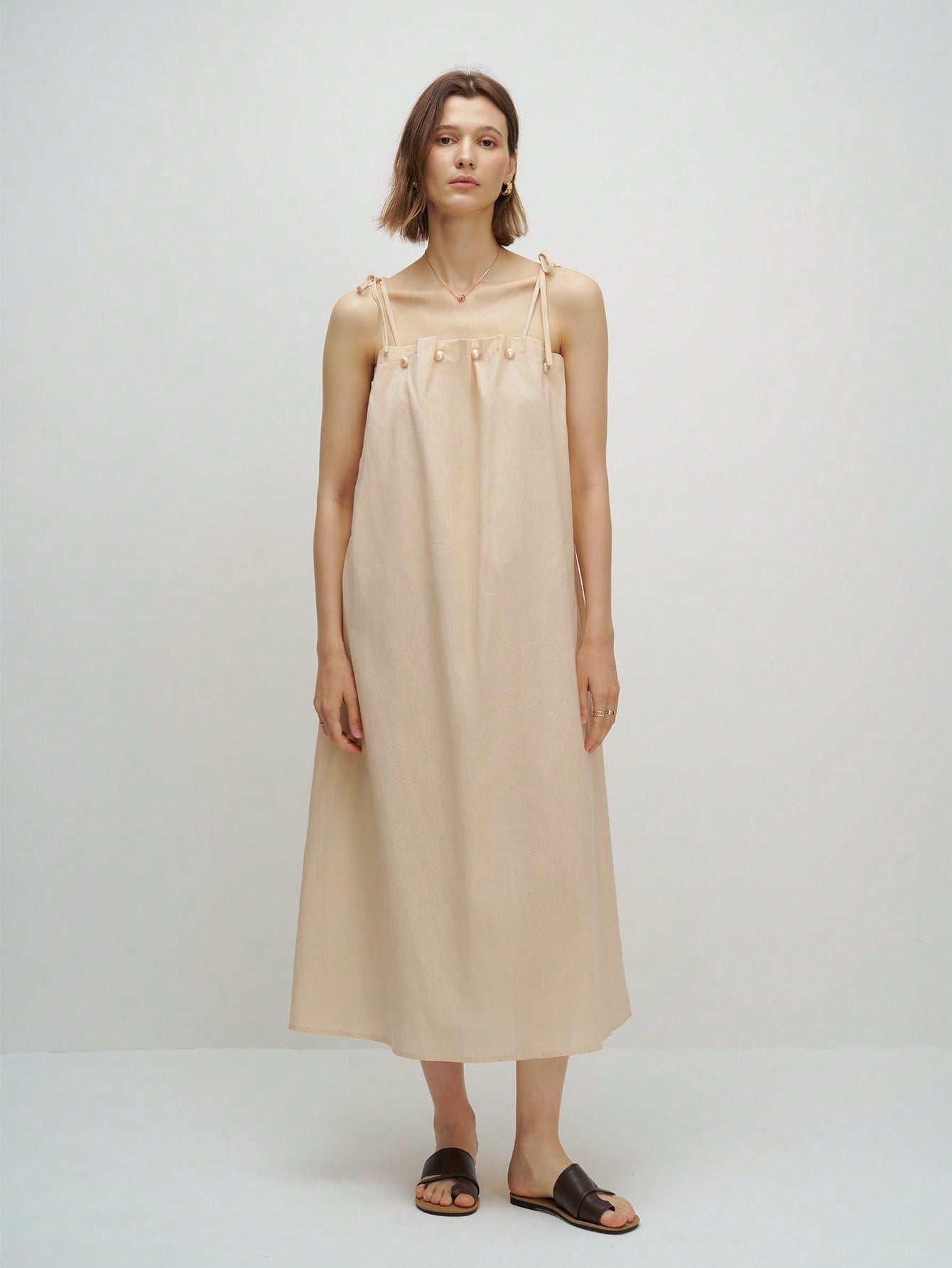 Stay cool and chic all summer long with this playful sleeveless dress. Its solid color and casual design make it the perfect go-to for effortless style, whether you're heading to brunch or a sunny stroll. Light, breezy, and easy to wear—this dress keeps you comfortable while turning heads.