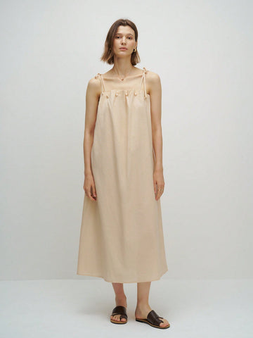 Stay cool and chic all summer long with this playful sleeveless dress. Its solid color and casual design make it the perfect go-to for effortless style, whether you're heading to brunch or a sunny stroll. Light, breezy, and easy to wear—this dress keeps you comfortable while turning heads.