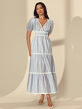 Escape to effortless elegance with this charming striped maxi dress! Featuring a flattering surplice neckline and playful puff sleeves, it's designed to turn heads whether you're strolling beachside or sipping cocktails at sunset. The tie waist cinches your silhouette beautifully while the flowing maxi length keeps you cool and comfortable all day long. Perfect for vacations, garden parties, or any occasion calling for breezy sophistication. This is the dress that makes you feel like you're always on holida