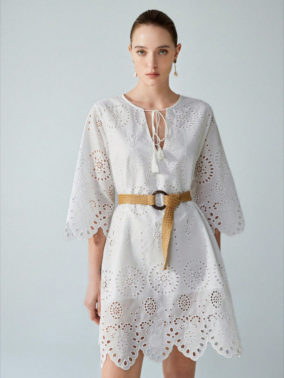 Step into vacation mode with this playful Women's Tie Front Embroidery Casual Dress. Featuring charming embroidered details and a flattering tie-front design, it effortlessly blends comfort and style. Perfect for sunny days and breezy evenings, this dress keeps your look fresh and fun wherever your adventures take you.