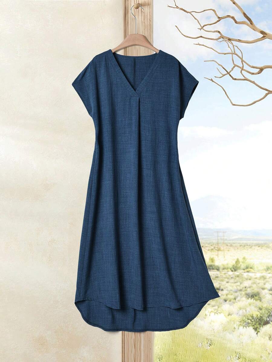 Elevate your summer wardrobe with our Women's V-Neck Batwing Sleeve High-Low Hem Dress! Perfect for effortless style, this dress features a flattering v-neck, flowy batwing sleeves, and a trendy high-low hem. Stay cool, comfortable, and stylish all season long.