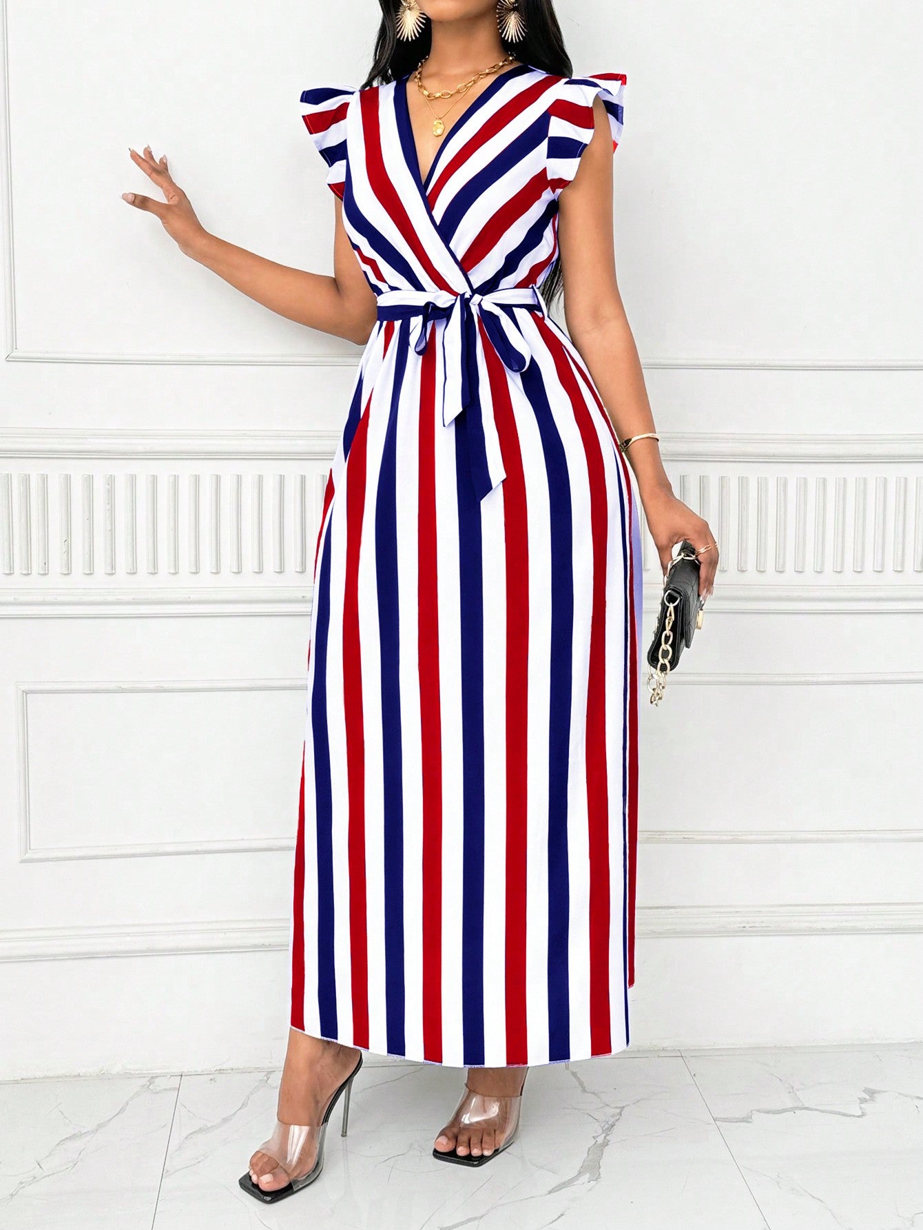 Twirl into style with our V-Neck Maxi Dress! The playful black and white stripes create an eye-catching look, while butterfly sleeves add a touch of whimsy. Cinch the flattering silhouette with the included sash tie for a customized fit. Perfect for summer soirées, beach vacations, or dressed up with accessories for evening events. This versatile dress brings fun and flair to any occasion!