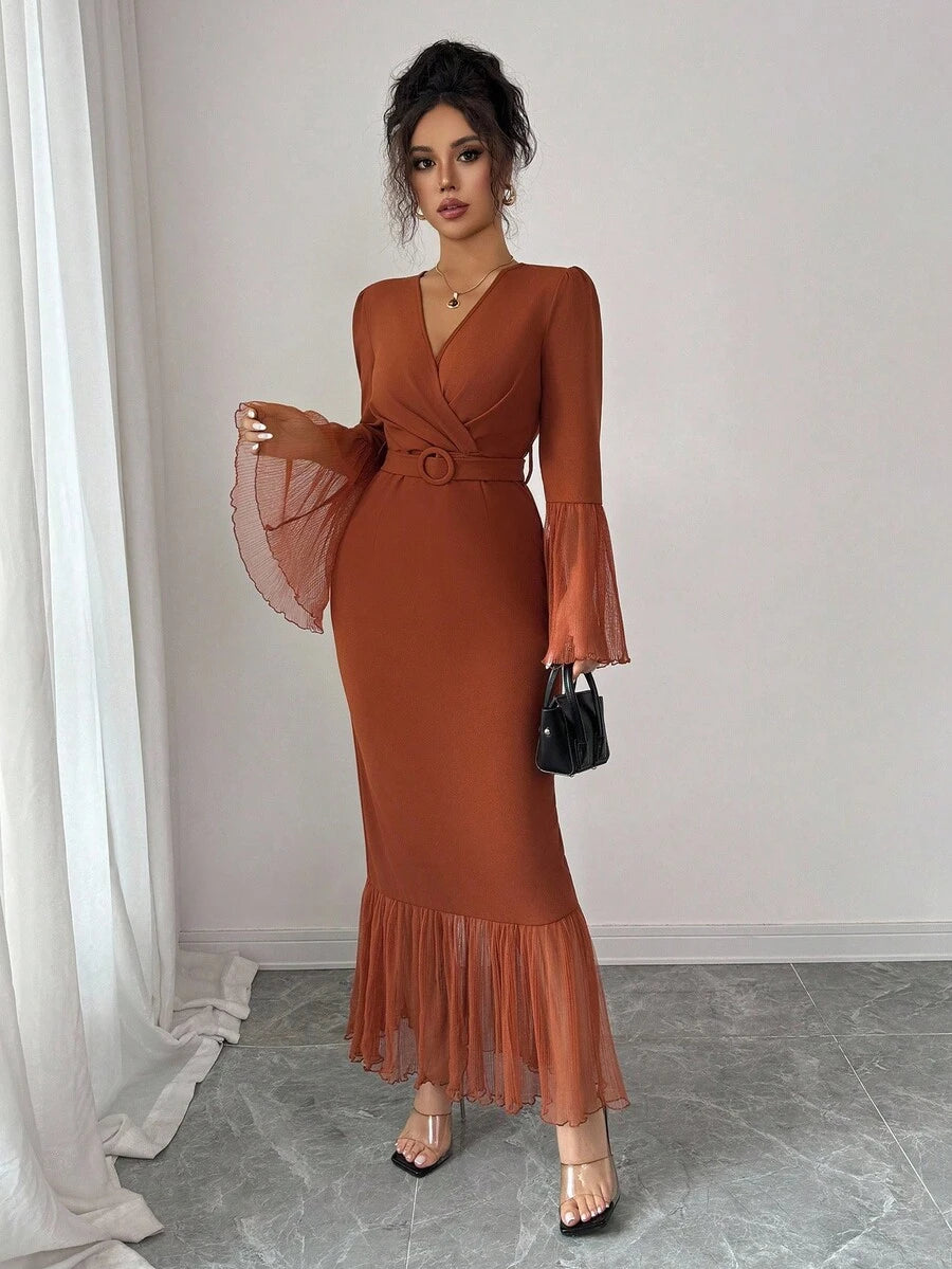 Turn heads at your next celebration in this stunning V-neck ruched mesh dress. The flattering ruching hugs your curves in all the right ways, while the sheer mesh fabric adds an effortless touch of elegance and movement. Perfect for spring and autumn parties, festivals, and nights out, this versatile piece transitions seamlessly from day to evening. The classic V-neckline frames your face beautifully, making it an instant go-to for any occasion where you want to feel confident and fabulous.