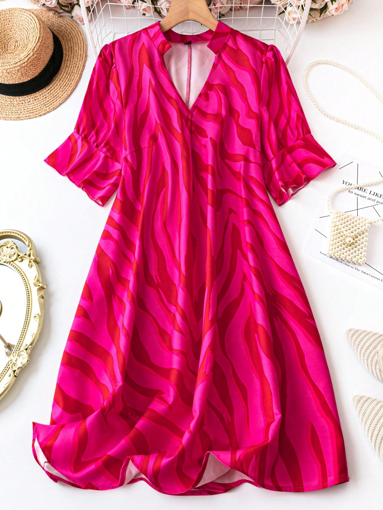 Unleash your wild side in our Women's Zebra Print Notch V-Neck Plus Size Dress! Stand out in style with the bold zebra print and flattering v-neckline. Perfect for any occasion, this dress is a must-have addition to your wardrobe. Embrace your curves and let the fun begin!